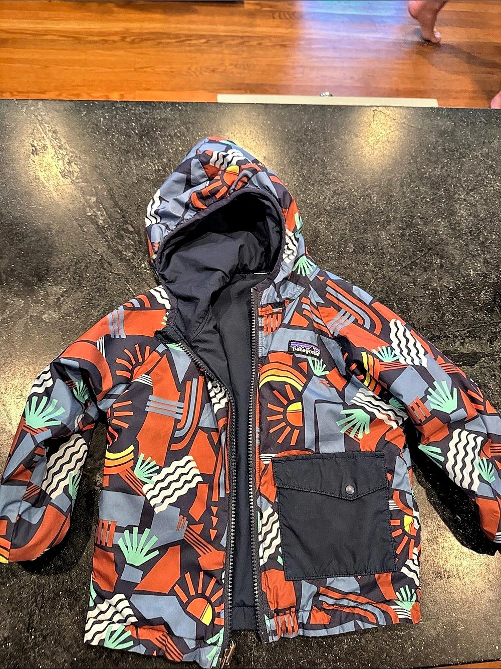 Patagonia Reversible Light Weight Hoody Kids Geometric Jacket Navy & Orange.